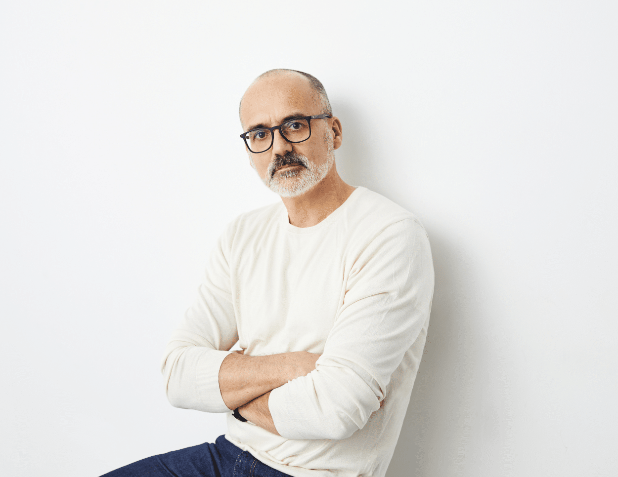Peter Langran poses with arms crossed