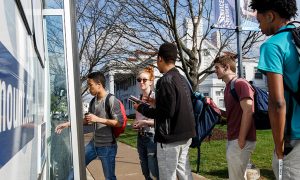 Students board the Marymount shuttle