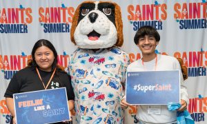 Students pose with Bernie the mascot
