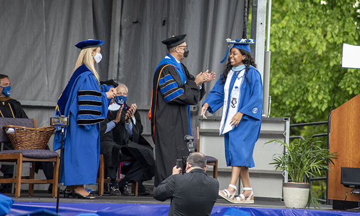 Faith Allen receives her Special Education degree during the 2021 Commencement Ceremony.