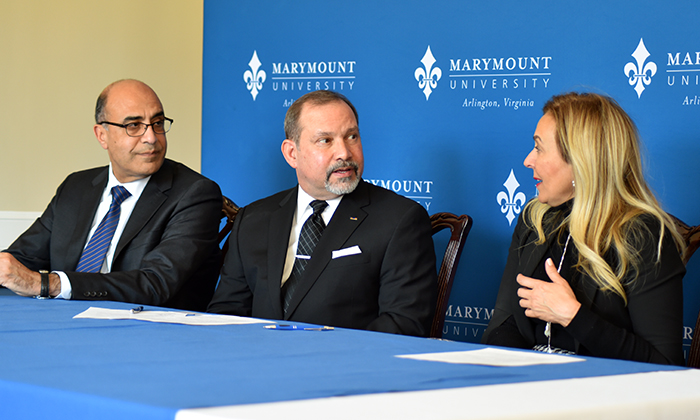 Latino veteran Danny Vargas (center) meets with Marymount University President Dr. Irma Becerra (right) and Provost Dr. Hesham El-Rewini (left) to cement their new partnership