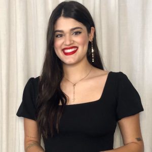Daniella Alexander smiles for a headshot