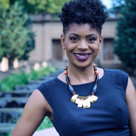 Christina J. Scott smiles for a headshot.