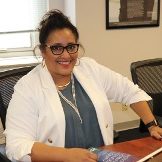 Dr. Beverly Stallings-Johnson smiles for a headshot