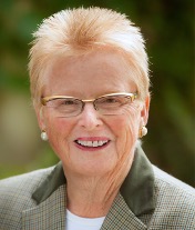 Dr. Francoise Lepage smiels for a headshot.