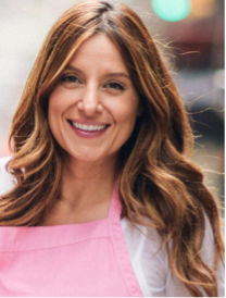 Katherine Kallinis Berman smiles for a headshot.
