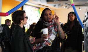 Brown-Bowers explains the inspiration for her work during the exhibit opening