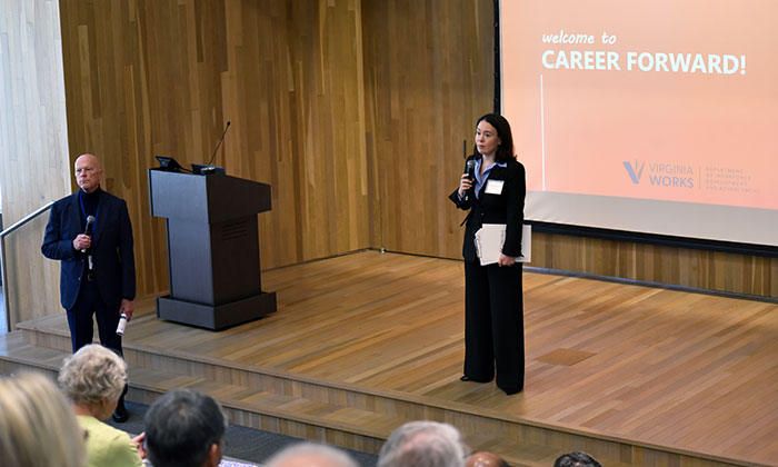 Virginia Works's Nicole Overley (right) and Marymount's Glenn Davidson (left) speak at the beginning of the Career Forward summit